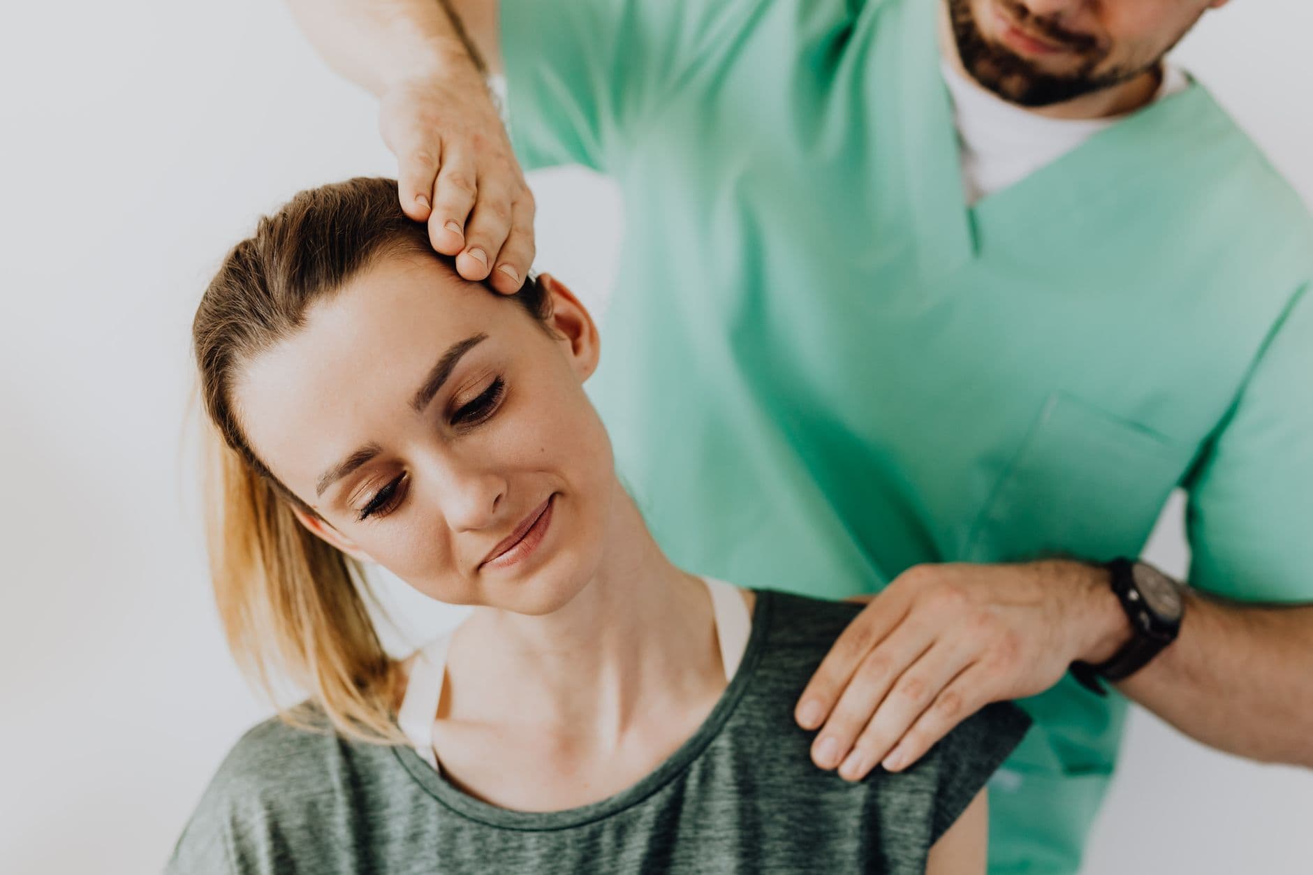 Chiropractor SEO services - chiropractor performing a spinal adjustment on a patient