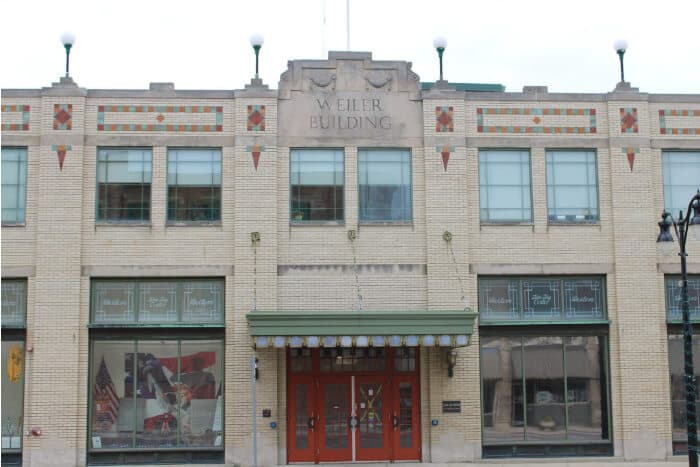 Historic Weiler Building in downtown Portland, Indiana representing the local retail heart