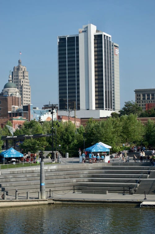 Downtown Fort Wayne Indiana skyline at dusk with buildings illuminated